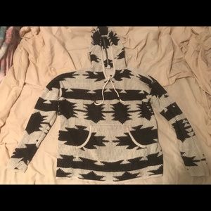 Hoodie with tribal print. Barley ever worn.